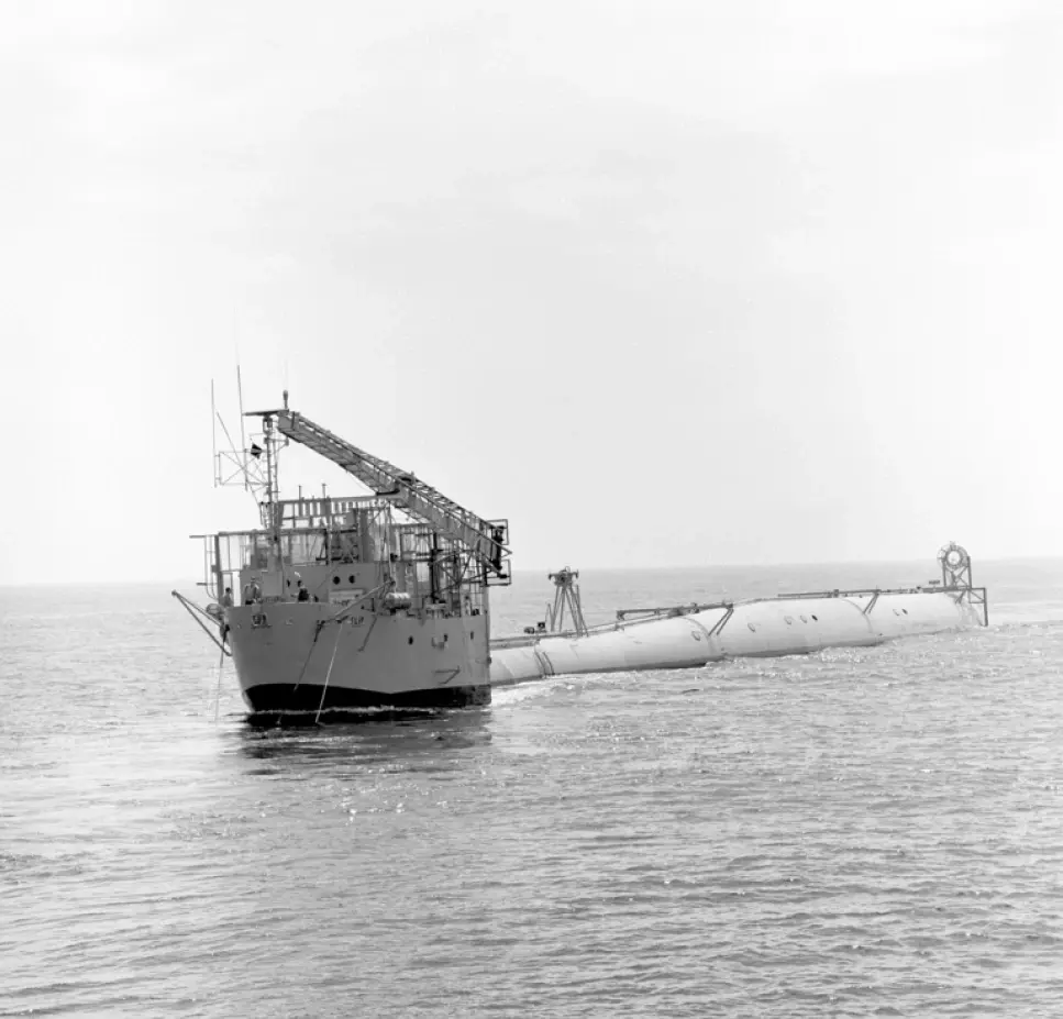Old black and white image of FLIP in horizontal position at sea